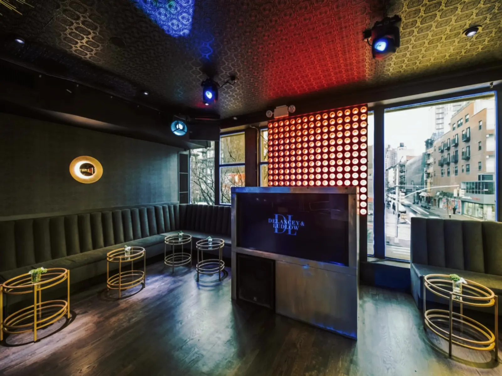 The Lounge with its LED wall, banquettes and gold tables