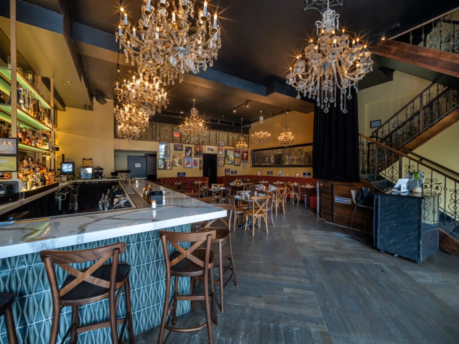 Crystal chandeliers over the bar at Le Jardin Bistro